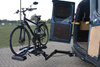 Swivel arm for bicycle racks